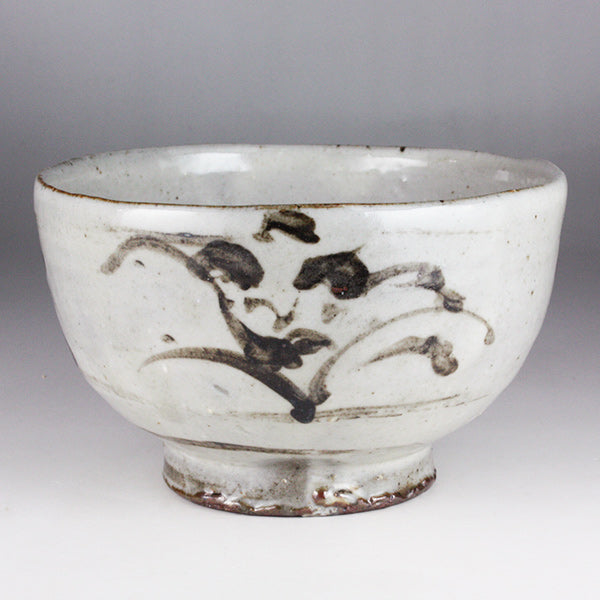 Iron-painted tea bowl by Shingo Oka