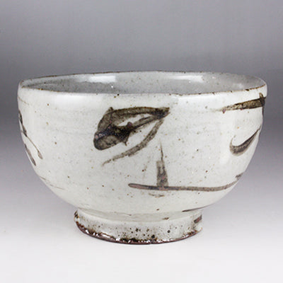 Iron-painted tea bowl by Shingo Oka