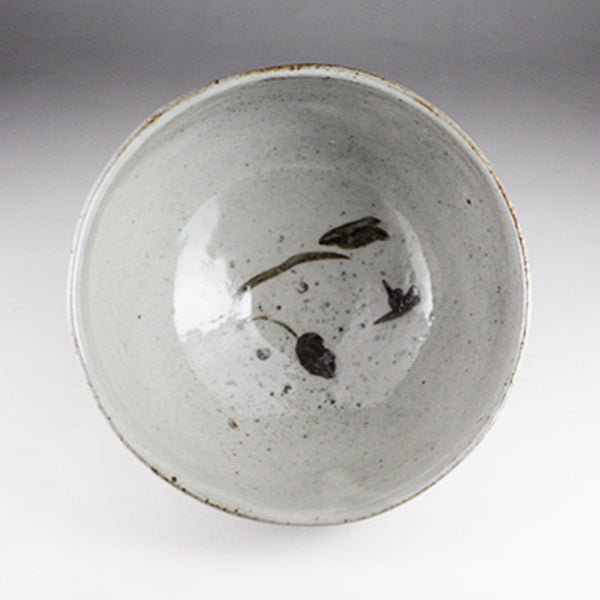 Iron-painted tea bowl by Shingo Oka