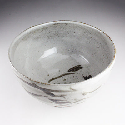 Iron-painted tea bowl by Shingo Oka