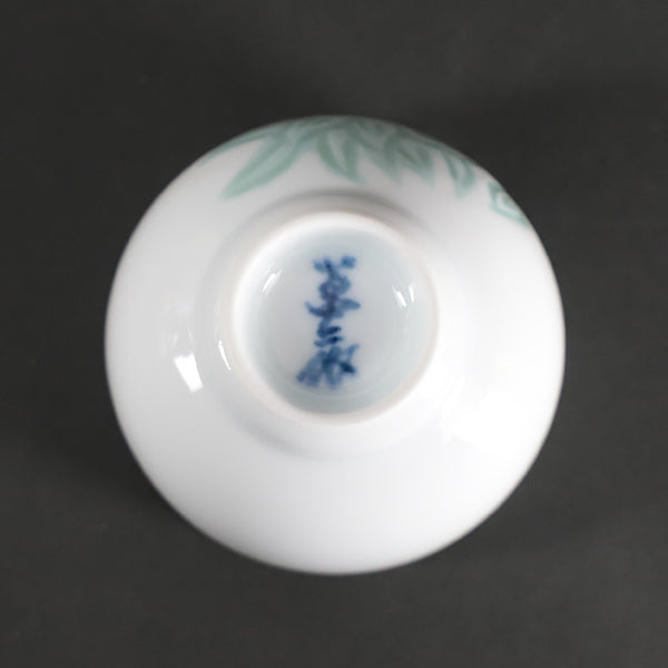 Manji Inoue white porcelain green glaze lily design sake cup
