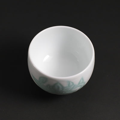 Manji Inoue white porcelain green glaze lily design sake cup