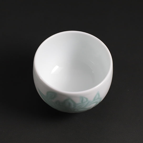 Manji Inoue white porcelain green glaze lily design sake cup