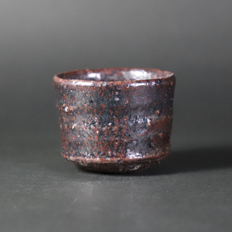 Black Karatsu sake cup 1 by Kota Tanaka