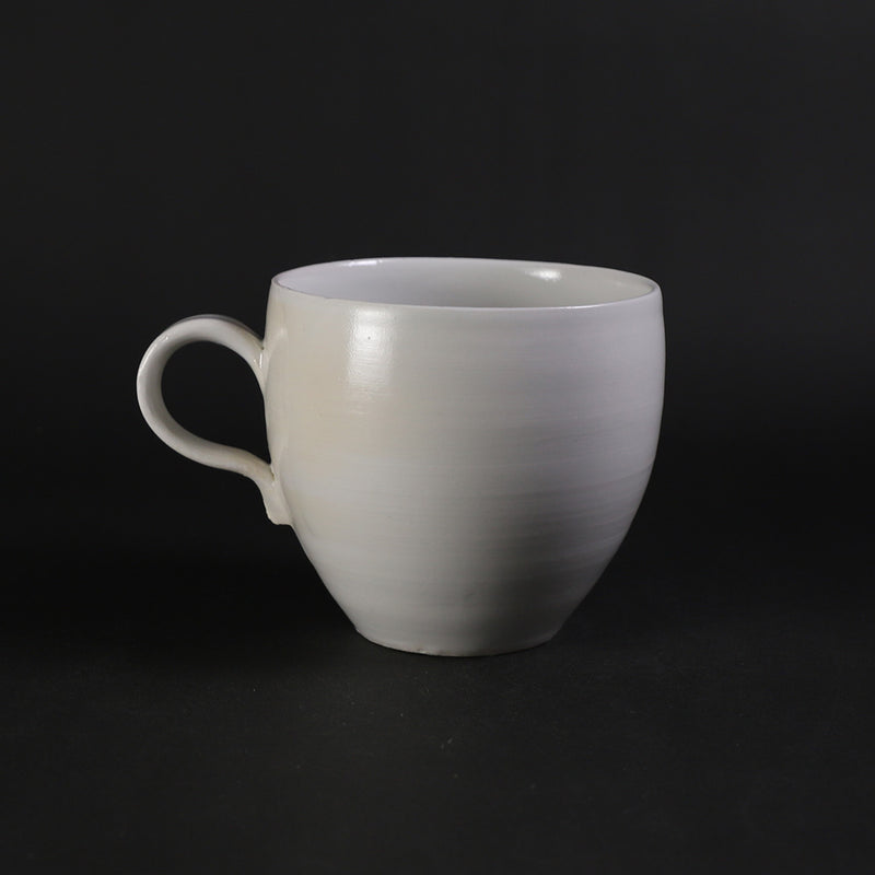 White porcelain cup and saucer by Masahiro Takehana