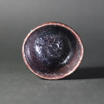 Black Karatsu sake cup 1 by Kota Tanaka