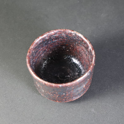 Black Karatsu sake cup 1 by Kota Tanaka