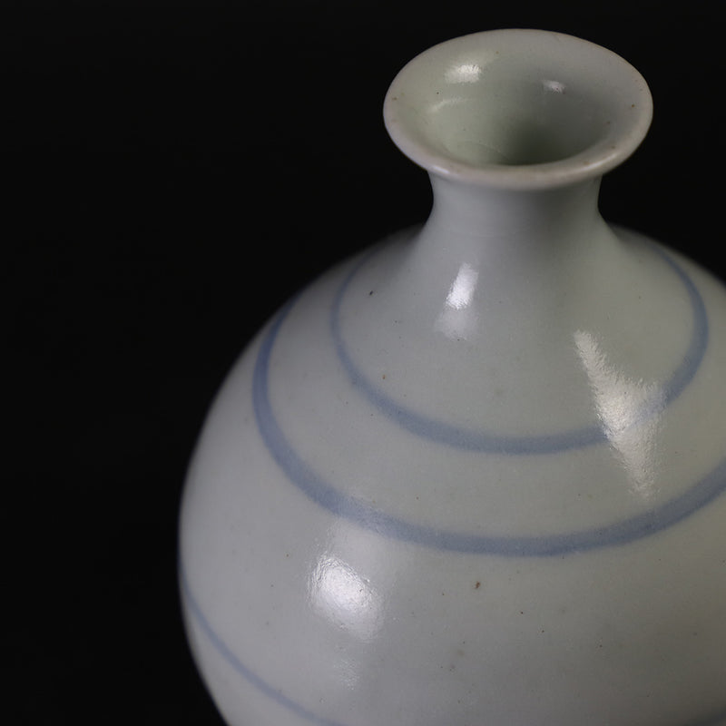 White porcelain sake bottle by Naoto Yano