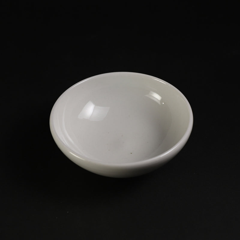 White porcelain sake cup by Takashi Nakazato