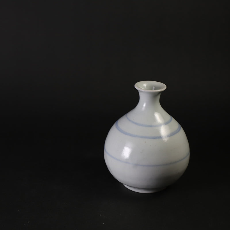 White porcelain sake bottle by Naoto Yano