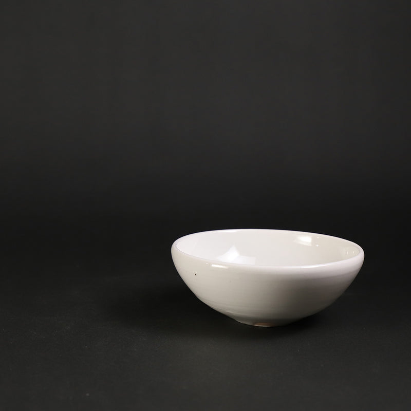 White porcelain sake cup by Takashi Nakazato